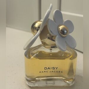Marc Jacobs Daisy Perfume, 3.4 oz. A few sprays gone.